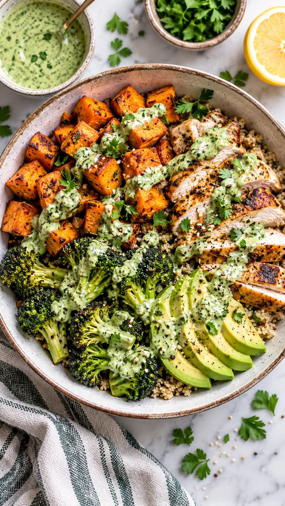 Healthy Dinner Meal Prep for the Week That Actually Saves You Time (and Tastes Amazing) 4 Top-down flat lay shot of a finished healthy dinner bowl featuring roasted sweet potatoes, grilled sliced chicken, charred broccoli, sliced avocado, and a vibrant green herb tahini drizzle
